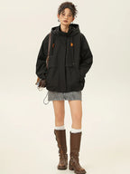 Kurtka uniwersalna z kapturem i oversize'owym krojem