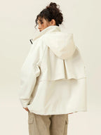 Kurtka uniwersalna z kapturem i oversize'owym krojem