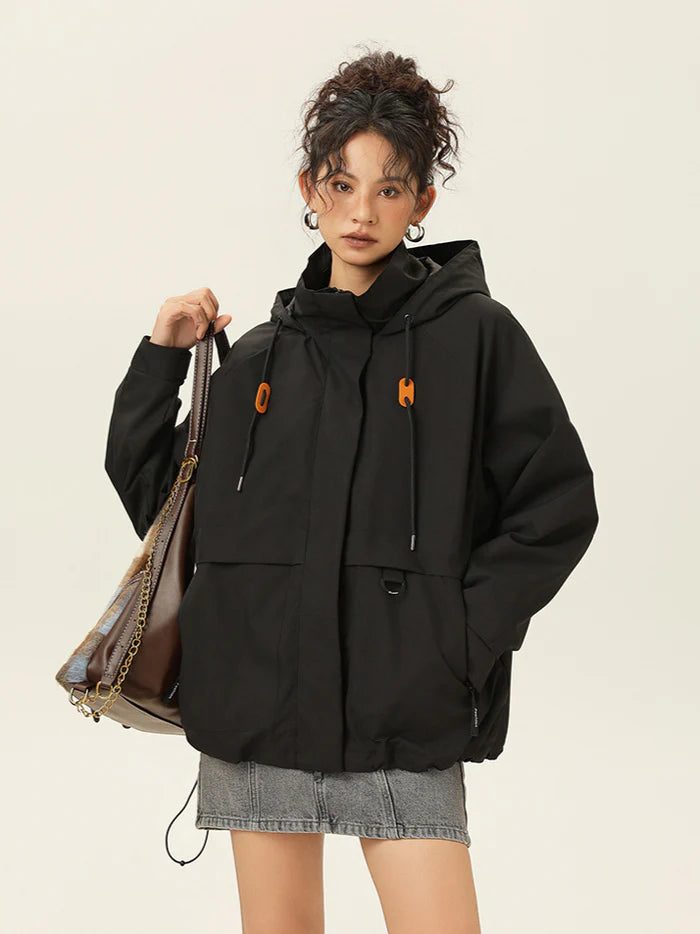 Kurtka uniwersalna z kapturem i oversize'owym krojem
