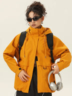 Kurtka uniwersalna z kapturem i oversize'owym krojem